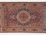 tapis persan ancien à motif de médaillon sur fond bleu