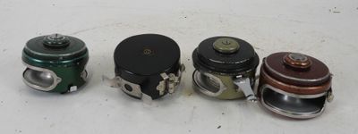 four different types of valves are lined up on a white surface