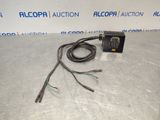a picture of an electrical device with wires attached to it