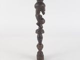 an image of a tall wooden candle holder on a white background