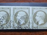 three stamps with a picture of a man and a woman on them