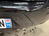a close up of a license plate on the back of a car