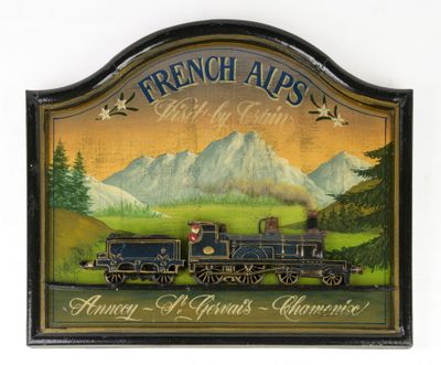 painting of a train on a wall with mountains in the background