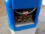 an image of a blue and white water dispenser