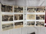 an old photo of a bunch of old photos on a table