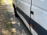 a white van parked on the side of the road