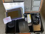 a suitcase with a lot of items inside of it