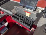 an image of a desk with a laptop on top of it