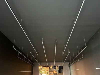 a man that is standing in the middle of a room