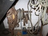 a bunch of rope hanging from the ceiling of a room