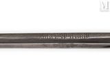 a close up of a baseball bat on a white surface