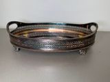 an image of a silver tray with handles on a table