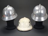 three helmets that are sitting on top of each other