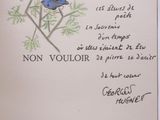a card with a picture of a blue flower on it
