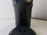 a coffee maker that is sitting on a table