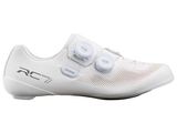 a close up of a pair of white shoes on a white background