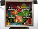 a close up of a pinball machine in a room