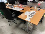 a desk with a computer and a printer on it