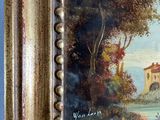 a picture of a painting on the wall of a house