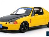 the yellow car is parked on a white surface with a white background