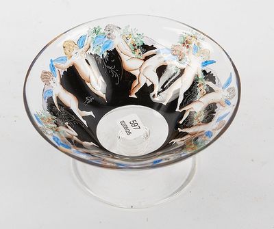 a glass bowl with a picture of a group of nudes on it