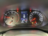 a close up of a car dashboard with a speedometer and gauges