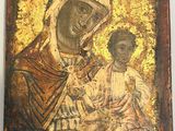 a painting of a woman holding a child in her arms