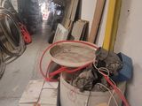 a room with a lot of boxes and wires on the floor