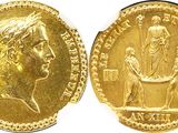 a close up of a gold coin with a man on it