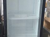 an image of an empty refrigerator in a store