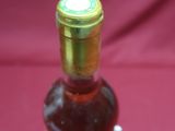 a bottle of wine that is sitting on a table