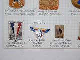 a lot of different badges on a piece of paper