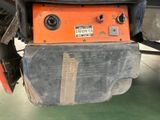 an image of a machine that is sitting in a garage