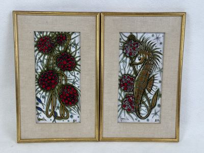 two framed pictures of a seahorse and a seahorse with flowers