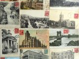 de nombreuses cartes postales anciennes représentant différents bâtiments accrochées au mur