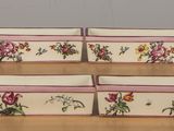 a picture of a white bowl with a floral design