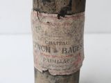 a bottle of wine sitting on a table with a label on it