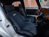 an image of a car with a steering wheel and seat covers