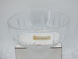 a glass bowl that is sitting on top of a box
