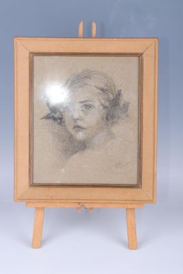 an old picture of a young girl with a bird on her head