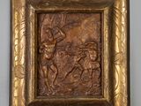 une image représentant une plaque en bronze sur laquelle figurent un homme et une femme