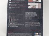 a close up of the back of a box with a hammer in it
