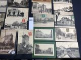 many old postcards that are on a table