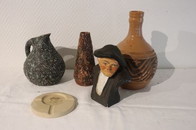 three vases that are sitting next to each other on a table