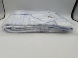 a pile of folded towels sitting on a table