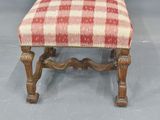 an image of a chair with a red and white checkered upholstered seat