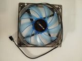 a close up of a computer fan on a white surface