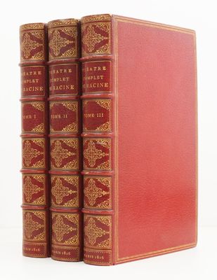 a set of three red books sitting on top of each other