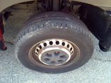 a close up of a tire on a vehicle