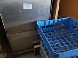 a blue basket and a silver dishwasher next to each other
